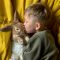 Child,Boy,Playing,With,Bunny,Rabbit.,Kid,Holding,Funny,Little